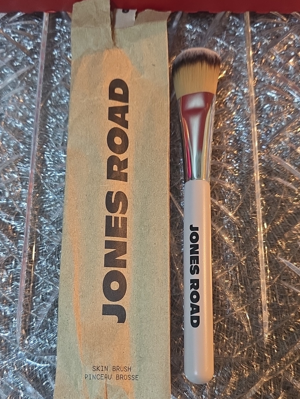 Jones Road Beige Handle Face Brush with Black-Tipped Bristles